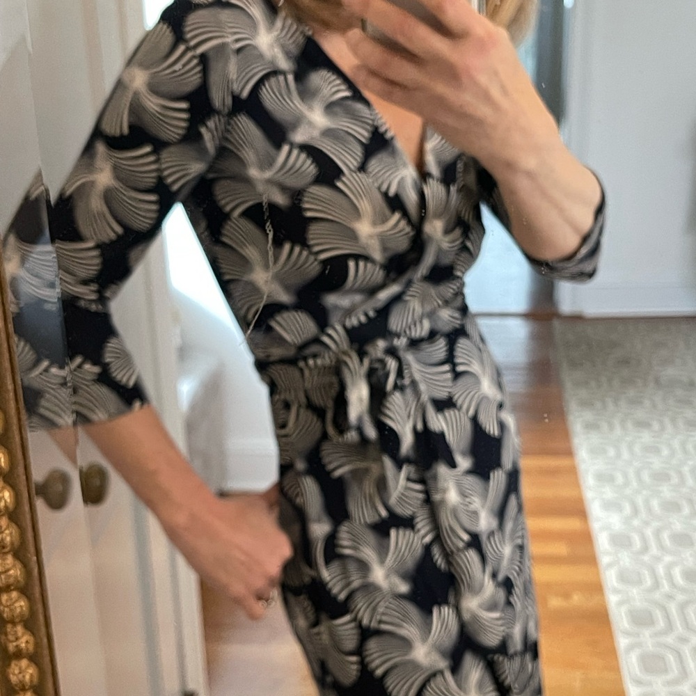Like new Diane von Furstenberg Black and White mid length Wrap Dress